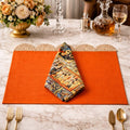 Orange Mats with Mesopotaniam Napkins